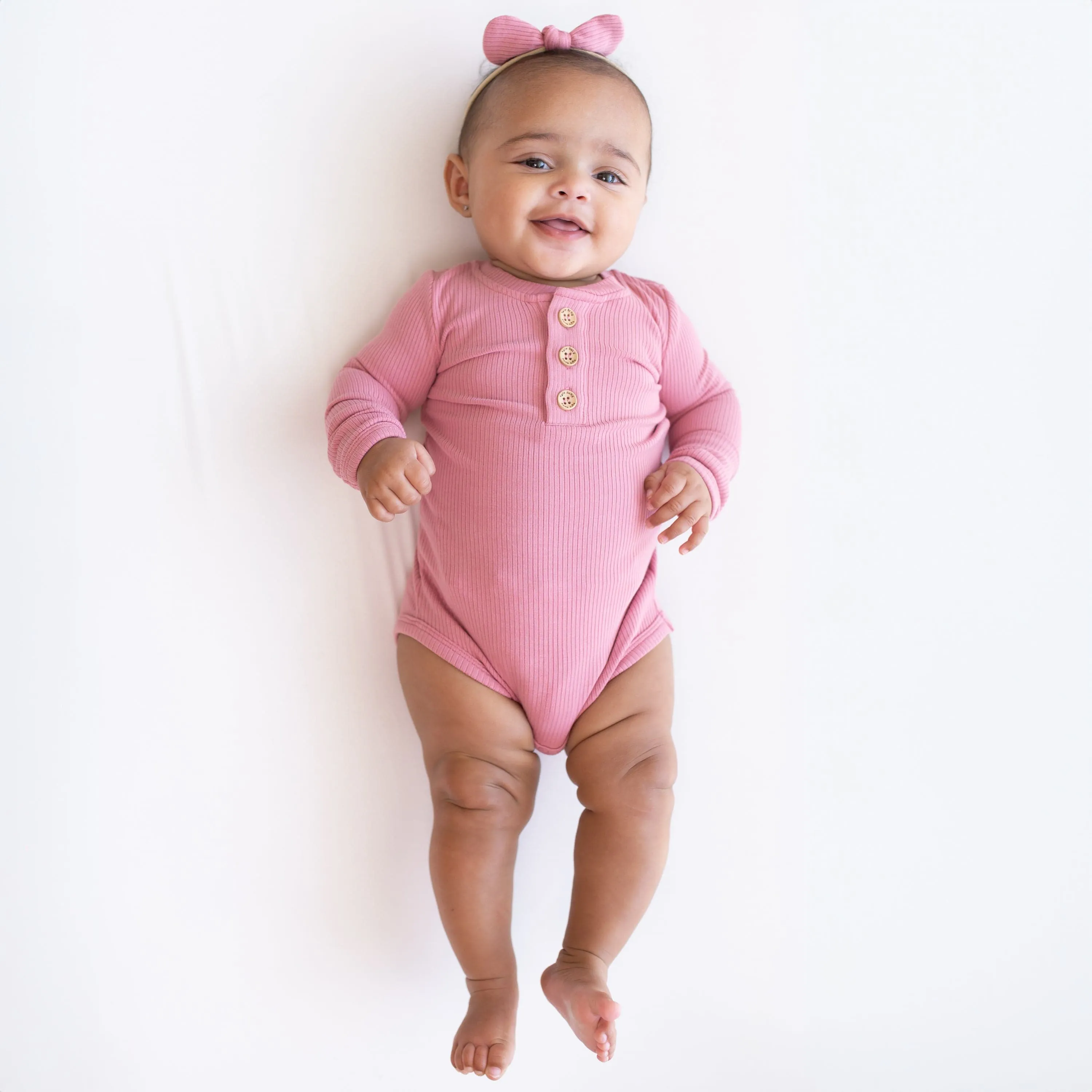 Ribbed Long Sleeve Henley Bodysuit in Apple Blossom